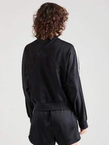 ADIDAS SPORTSWEAR - Chaqueta deportiva 'Tiro' en negro