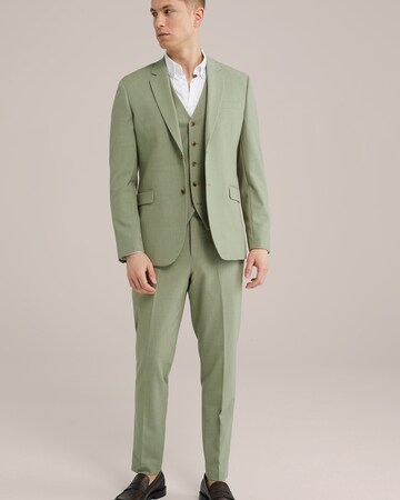 Tapered Pantaloni con piega frontale di WE Fashion in verde