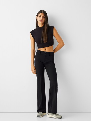 Bershka Flared Pleated Pants in Black