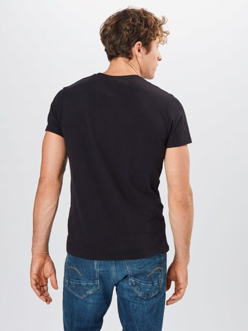 Coupe regular T-Shirt 'NYC' Superdry en noir