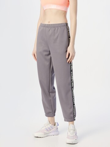 new balance Tapered Sports trousers 'Relentless' in Grey: front