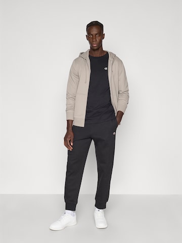 Champion Authentic Athletic Apparel Tapered Pants in Black