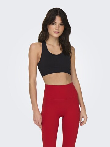 ONLY PLAY Regular Sports bra 'Daisy' in Black: front