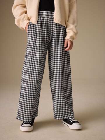 Next Loosefit Hose in Schwarz: Vorderseite