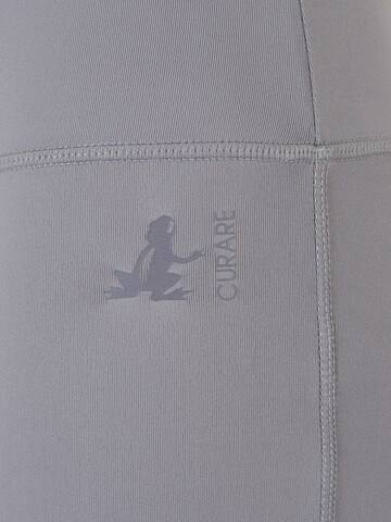 CURARE Yogawear - Skinny Calças de desporto em cinzento