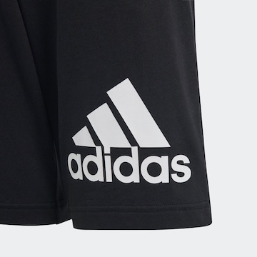 ADIDAS SPORTSWEAR Loosefit Urheiluhousut 'Essentials Big Logo ' värissä musta