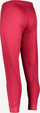 NIKE Tapered Workout Pants in Pink