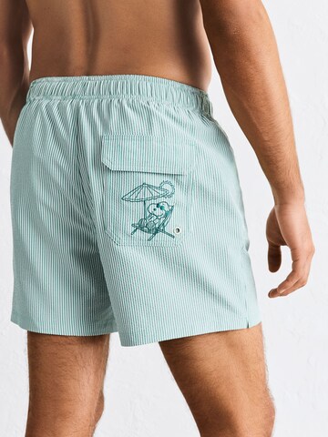 Shorts de bain 'Snoopy' Next en vert