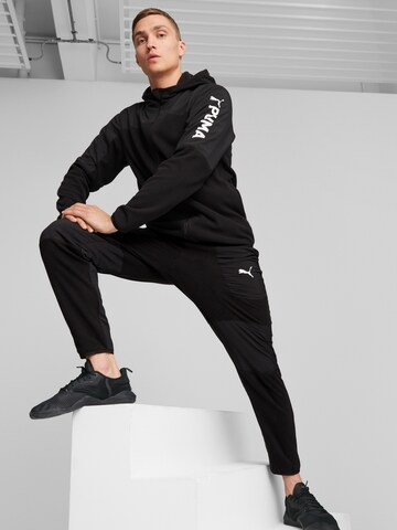 PUMA Tapered Sports trousers 'Fit Hybrid' in Black