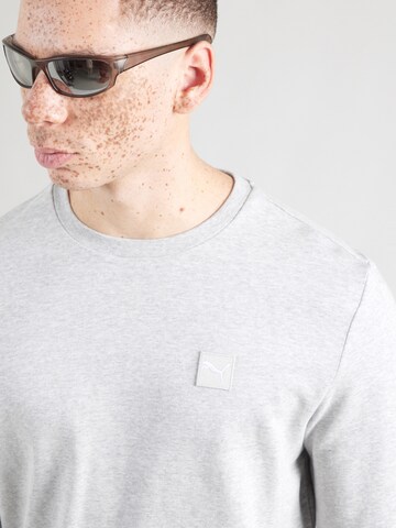 pilka PUMA Sportinio tipo megztinis 'Essentials'