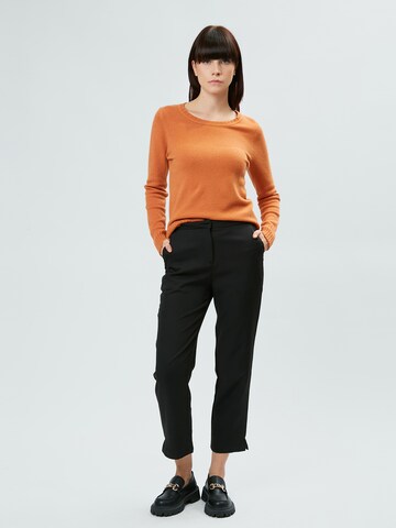 Pullover di Influencer in arancione