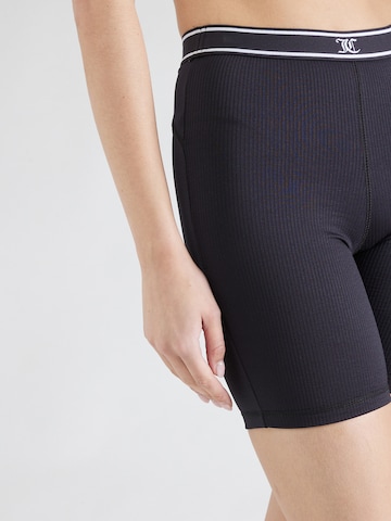 Skinny Pantaloni sportivi di Juicy Couture Sport in nero