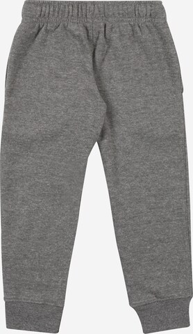 Effilé Pantalon 'Club' Nike Sportswear en gris