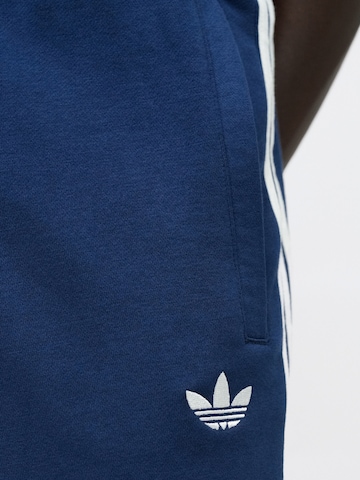 Effilé Pantalon ADIDAS ORIGINALS en bleu