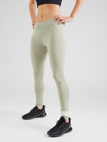 PUMA Skinny Sportbroek 'ESS No. 1' in Groen: voorkant