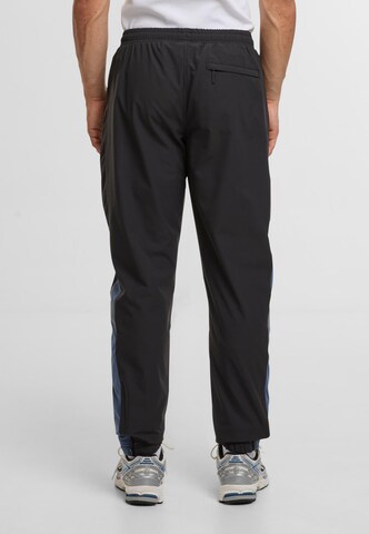 Regular Pantalon de sport 'Apice' Sergio Tacchini en noir