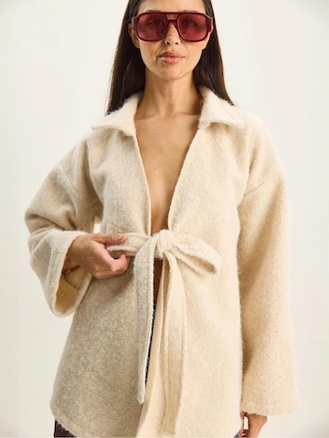 Cardigan Bianco Lucci en beige