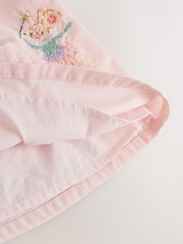 Set Next en rose