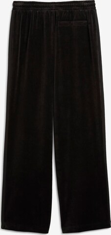 PUMA regular Παντελόνι φόρμας 'T7' σε μαύρο