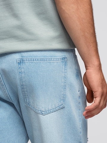 Ombre Tapered Jeans 'Carrot' in Blue