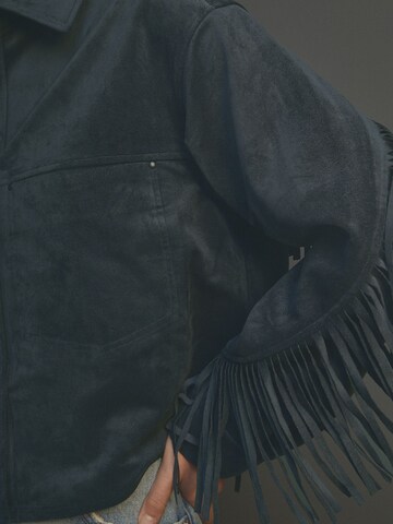 Next Tussenjas in Blauw