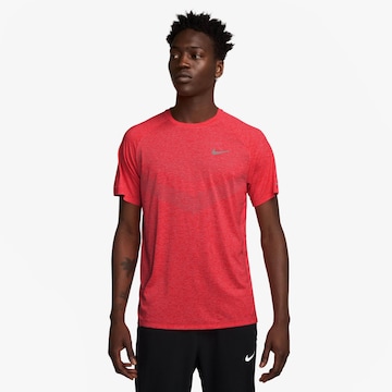 NIKE Performance Shirt 'DFADV STRIDE' in Orange: front