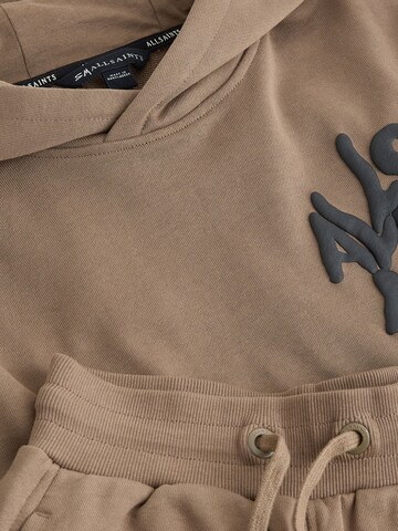 smALLSAINTS - Ropa para correr en marrón