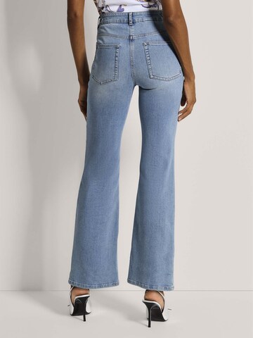 évasé Jean MADELEINE en bleu