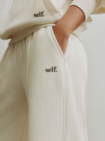 smėlio self. Plačios klešnės Kelnės