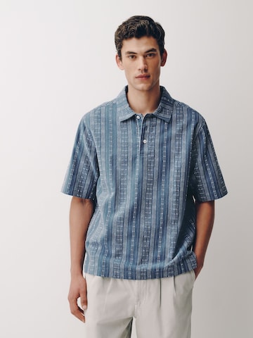 Tricou de la Next pe albastru: față