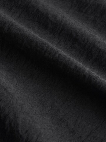 Combinaison Next en noir