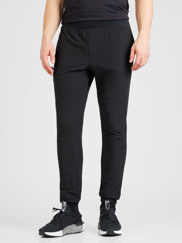 UNDER ARMOUR - Tapered Pantalón deportivo en negro: frente