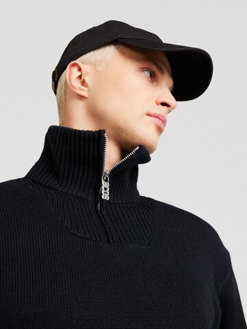 Pullover di GCDS in nero