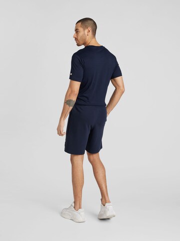 Champion Authentic Athletic Apparel Regular Broek 'Legacy' in Blauw