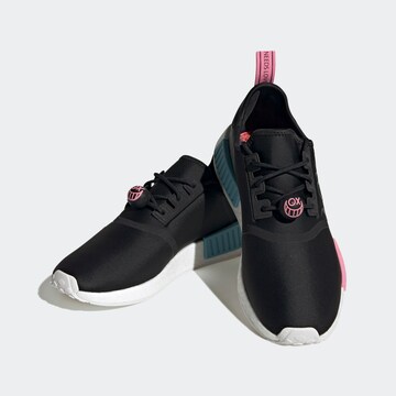 ADIDAS ORIGINALS Sneakers 'NMD_R1 x André Saraiva' in Black