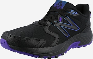 Chaussure de course '410' new balance en noir : devant