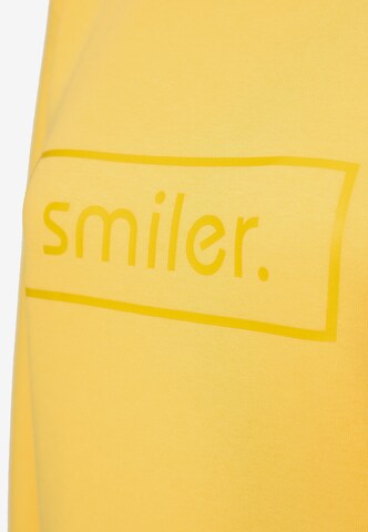 Sweat-shirt 'Cuddle' smiler. en jaune