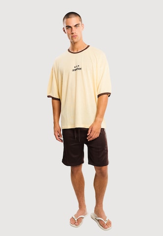 Maglietta 'Rave Dept. Ringer' di Another Cotton Lab in giallo