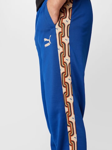 Regular Pantaloni sport 'Psychedelic' de la PUMA pe albastru