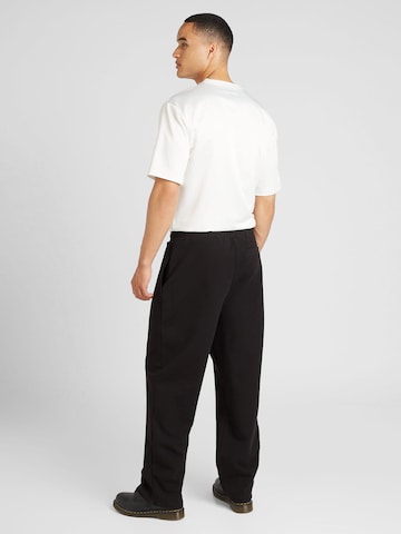 TOPMAN Zvonové kalhoty Kalhoty se sklady v pase – černá