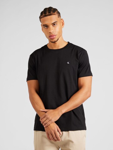 T-Shirt Calvin Klein Jeans en noir : devant