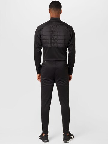 PUMA Slimfit Sportbroek in Zwart