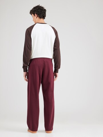 Loosefit Pantalon 'ESS' ADIDAS ORIGINALS en rouge