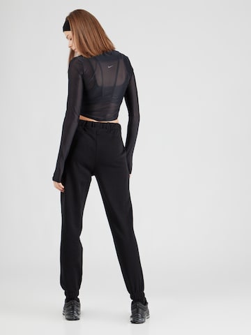 Effilé Pantalon de sport 4F en noir