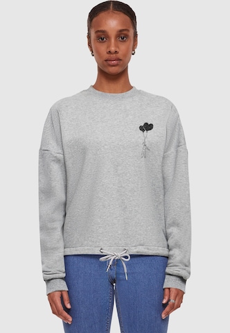 Sweat-shirt 'Love In The Air' Merchcode en gris : devant