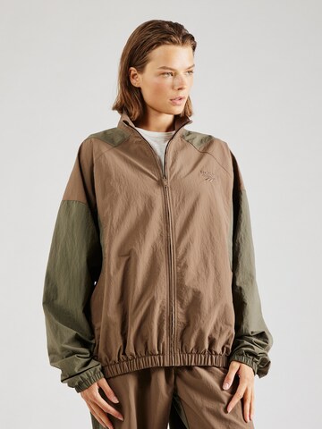 Reebok Between-Season Jacket in Green: front