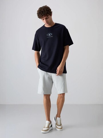 Maglietta di Tommy Life in blu