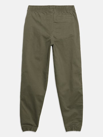 Calvin Klein Jeans Tapered Housut 'ESSENTIAL' värissä vihreä
