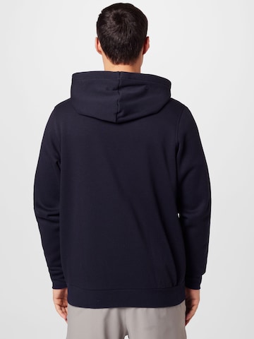 Veste de survêtement 'Essential' UNDER ARMOUR en noir