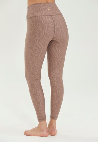 Athlecia Slimfit Tights 'Alma' in Braun